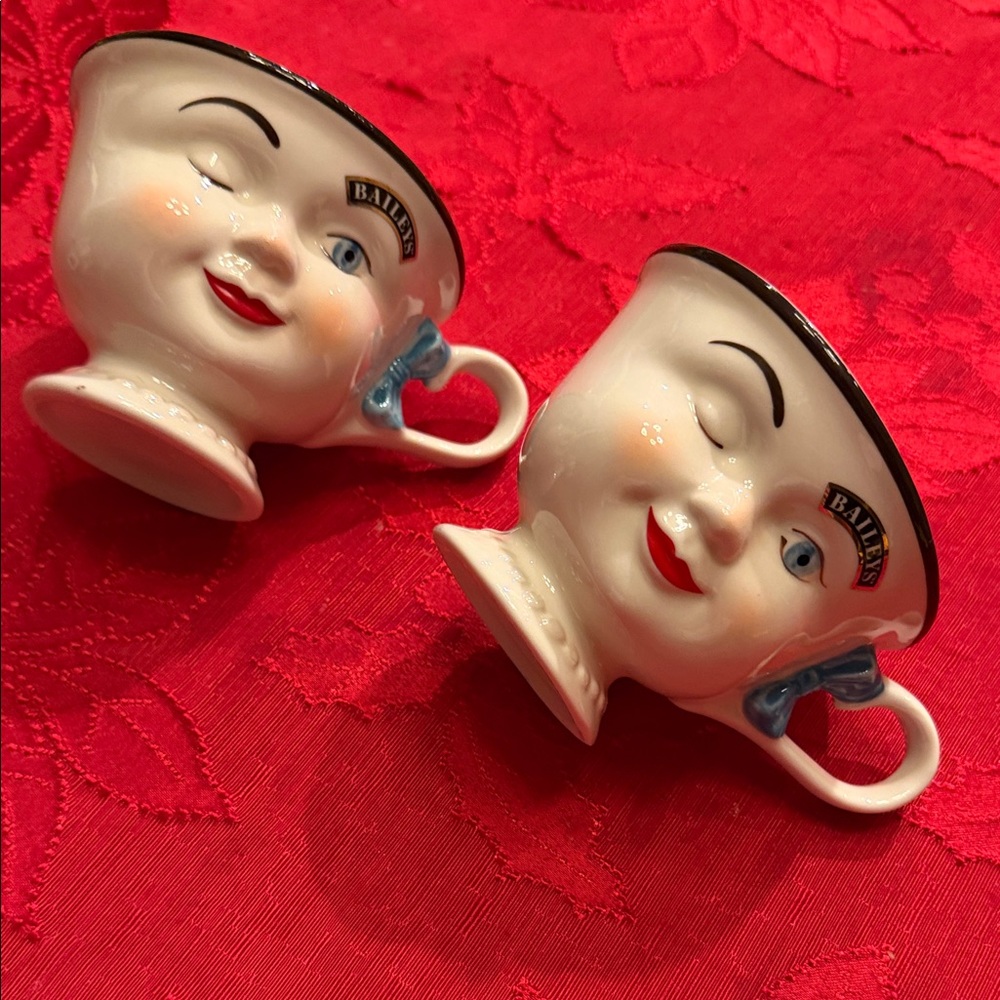 Set of 2 Vintage Baileys Winking Face Mugs - White and Blue